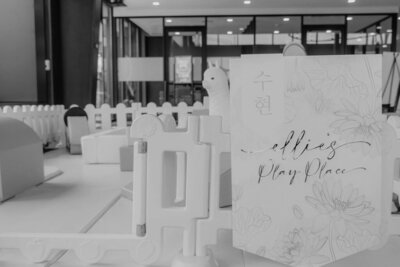 Black and white image of party signage for doljabi planned by Fancy Chancey in San Diego CA