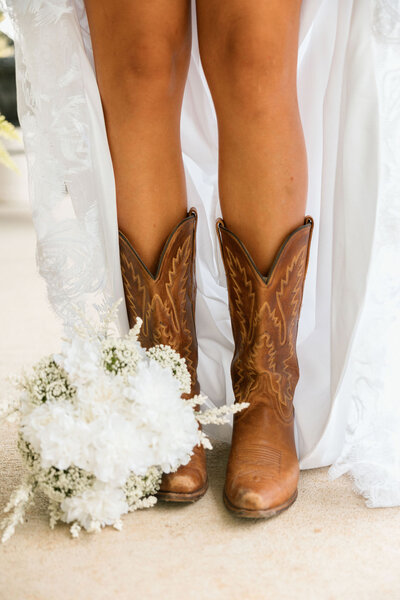 detail shots of brides cowboy boots