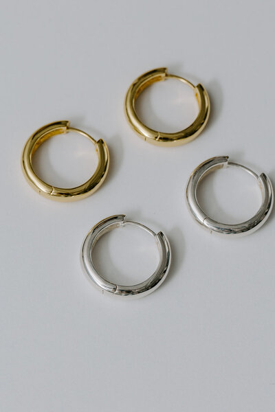 High-quality, eco-friendly jewelry for conscious consumers, hoops against a white backdrop.
