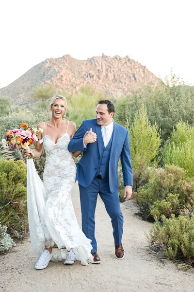 Phoenix-Wedding-Photographer-and-Videographer-Bride-and-Groom-Walking-Four-Seasons-Scottsdale-BorWed-1287