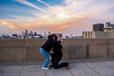 couple embracing during arizona rooftop proposal