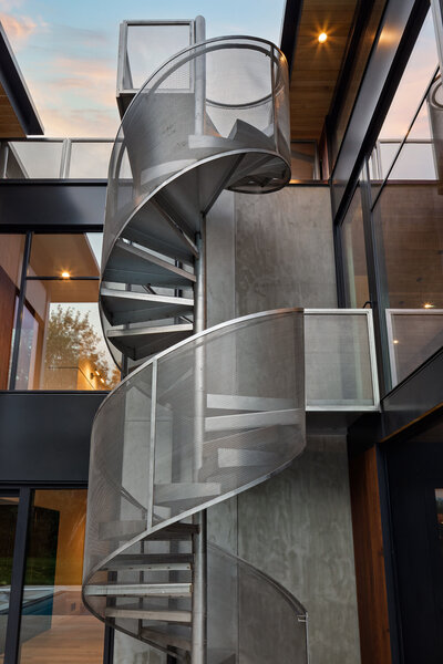 Concrete wall cladding with steel stairs
