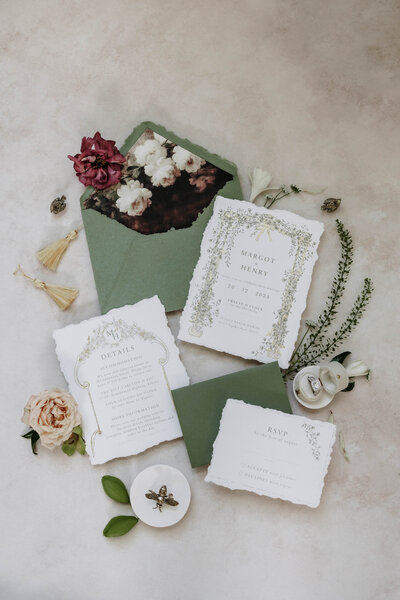 european style wedding invitation flat lay photo