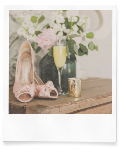 detail photo of brides flowers and shoes before wedding in las vegas venue