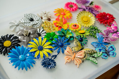 A collection of vintage enamel flower and butterfly brooches - Bloom by bel monili