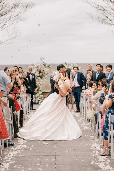 couple kiss at the end of the ceremony at a Washington D.C. wedding