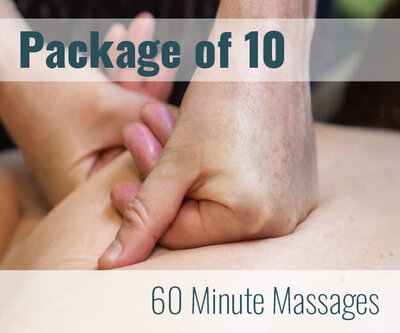 Female on floor getting leg work Thai massage