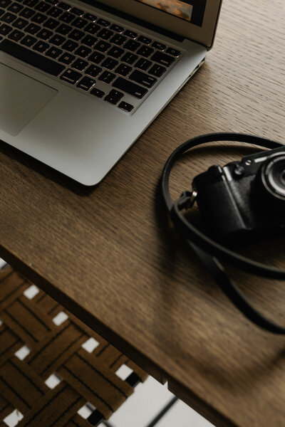 kaboompics_remote-work-and-home-office-with-laptop-phone-and-camera-38966