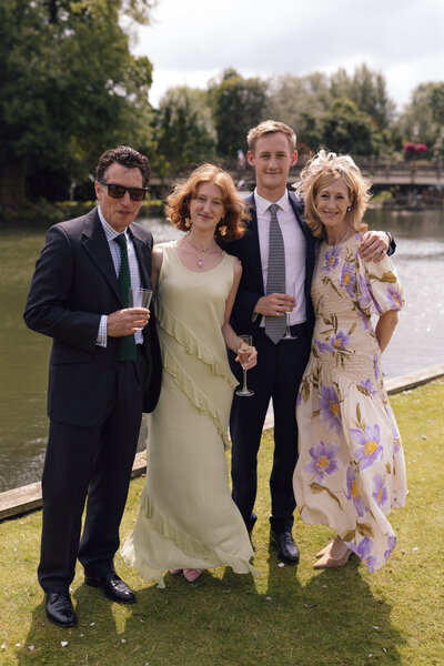 Wedding photographer captures couple taking a stroll hand in hand at their french chateau wedding.