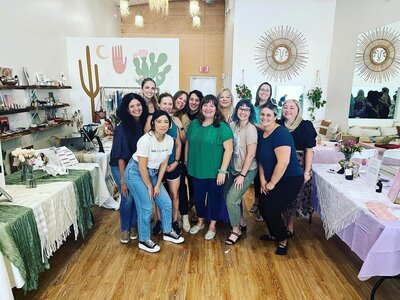 Group photo of women entrepreneurs and Cactus & Pine Photography owner