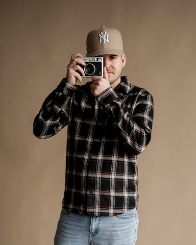 Austin Ryan Photo capturing polaroids during a recent session.