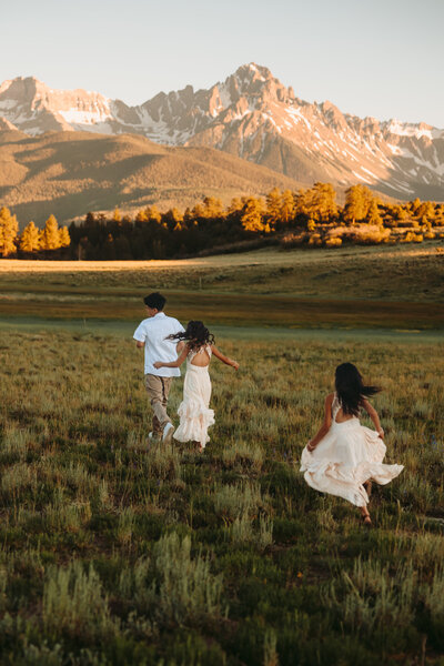 Couple shares a kiss after their mountaintop elopement in Ouray, Colorado.