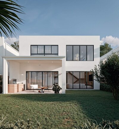 Vela Signature Range rear view featuring alfresco entertaining space, landscaped backyard, and modern architectural style.