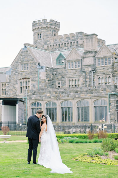 NYC Wedding at Sands Point Preserve Long Island.  Image Capture of Bride & Groom In front of Castle, taken by New York City Wedding Photographer Corey Lamar Photography