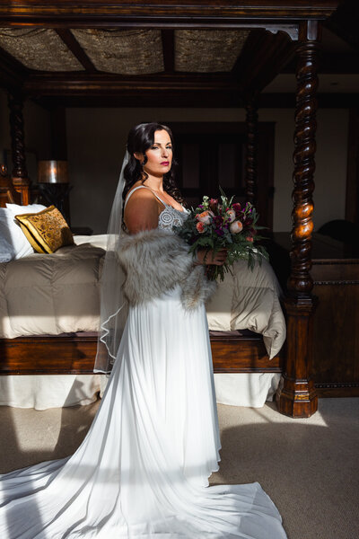 bride holding bouquet taken by Minnesota wedding photographer Marcus Hanenburg Photography