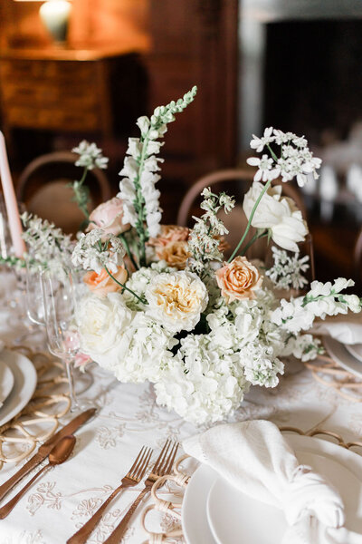 beautiful spring flower arrangement on table at reception