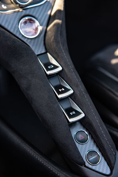 mclaren-720s-spider-convertible-black-for-rent-in-miami-center-console-drive-buttons-021