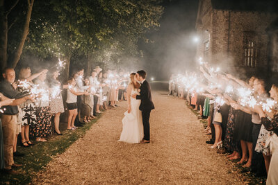 bridal-party-pulling-silly-poses-tithe-barn-perterfield