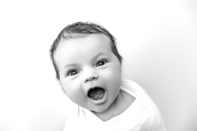 dad and baby looking at each other during phoenix newborn session