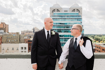 Newlywed couple smiling at each other