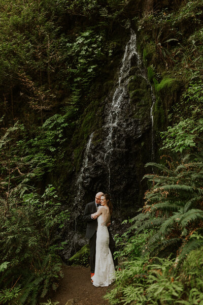 Bride and groom exploring whidbey island