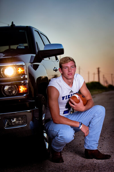 senior-guy-sunset-football