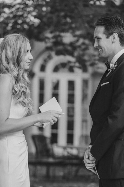 a bride and groom exchange teary vows during a first