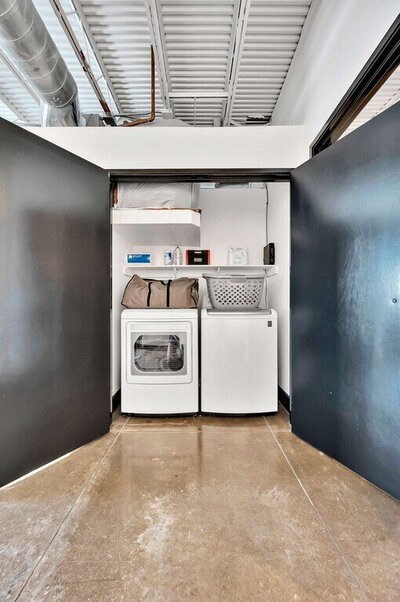 Free washer and dryer included in this one-bedroom, one-bathroom luxury condo in the historic Behrens building in downtown Waco, TX.