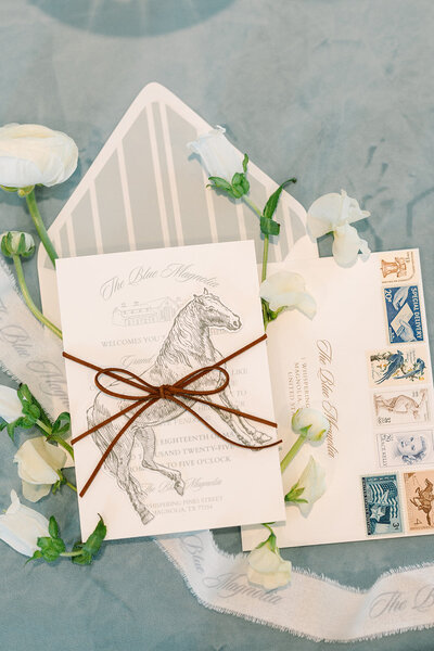 White bridal shoes on blue chair