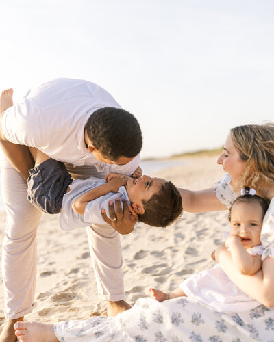 Candid family portrait on the beach