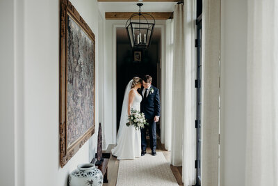 bride and groom in home