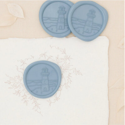 Mountain destination wedding wax seal with mountain scenery and trees