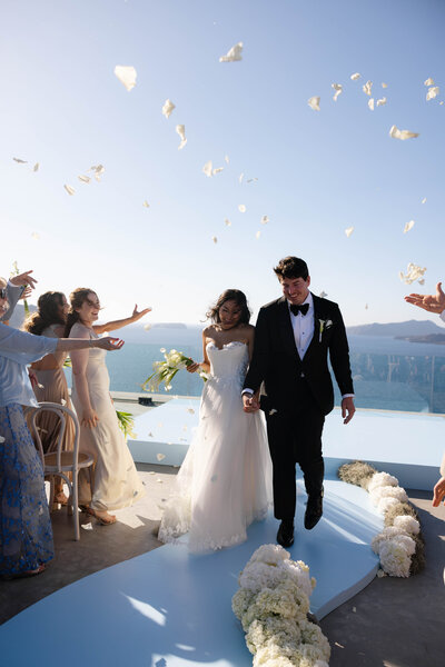 flash wedding photography of the bride and groom on a couch together
