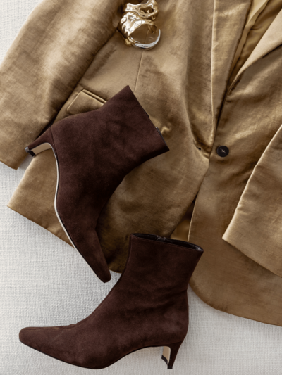 Shop Rose Prada’s curated fashion looks featuring neutral tones, vintage vibes, and timeless tailored pieces.