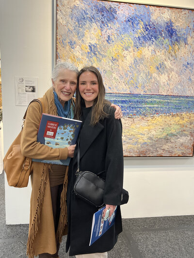 Alexandra Eveland and her grandmother at an artshow