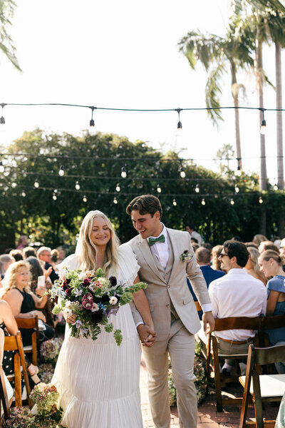 bride and groom in entryway