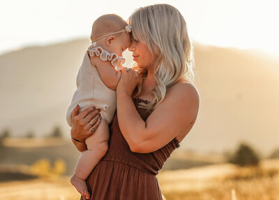 Beautiful family session in Boulder with the most amazing light. in the background with the Rocky Mountains.