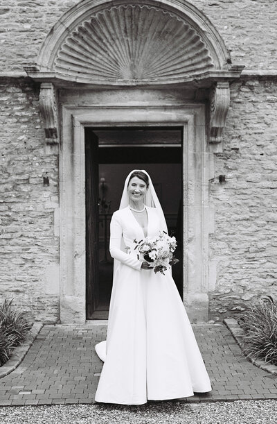 Kin House bride wears Justin Alexander wedding dress captured on 35mm film