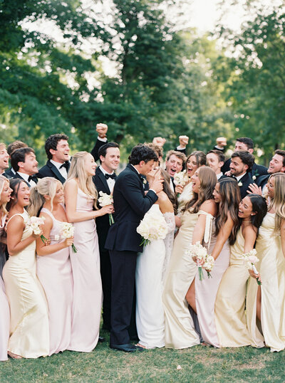 Authentic emotional moment between newlyweds during an Austin wedding, captured in digital photography by Anna Minton.