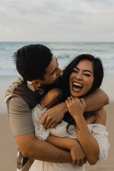 Sunrise engagement session on the beach at Crystal Cove state park