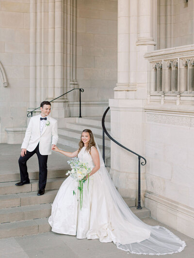bride and groom posing during sunset