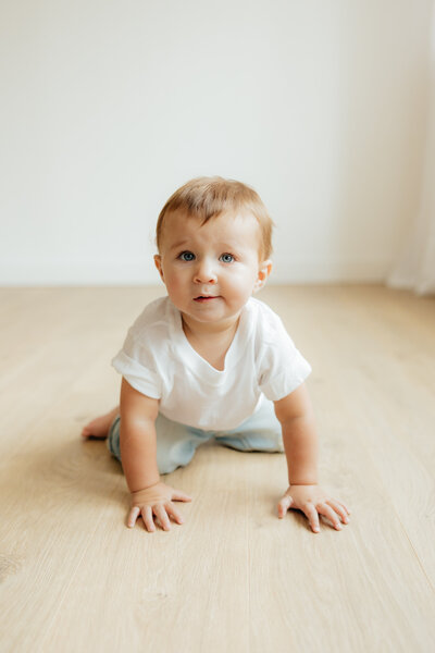 baby crawling for milestone photos