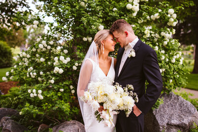 Wedding couple with white flower bouquet - Mayville, North Dakota