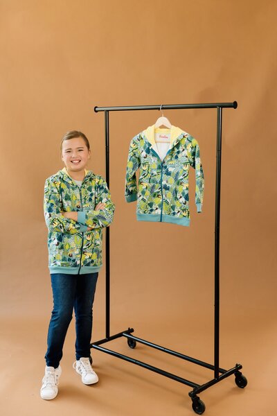 a boy wearing a special edition jacket