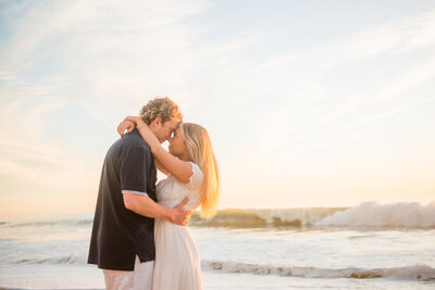 romantic couple during sunset at the beach