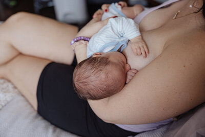 Nursing baby during newborn session in Chicago, IL 