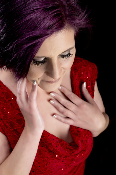 Southcoast MA Boudoir  client with purple hair wearing a red sparkly dress