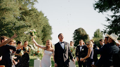 Couple exits their wedding ceremony