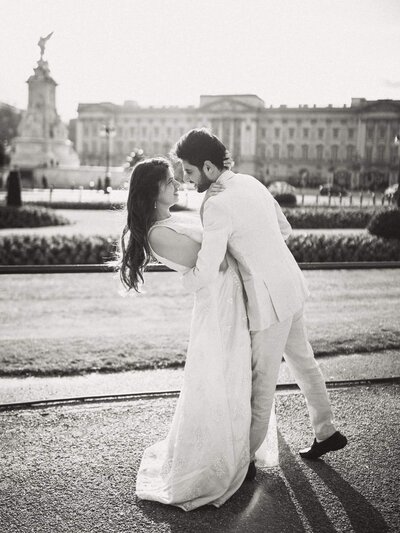 A-romantic-couple-posing-for-London-elopement-photographer-at-iconic-tower-bridge-7880