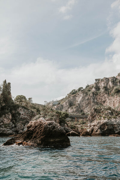 Landscape destination wedding of the ocean in Sicily, Italy